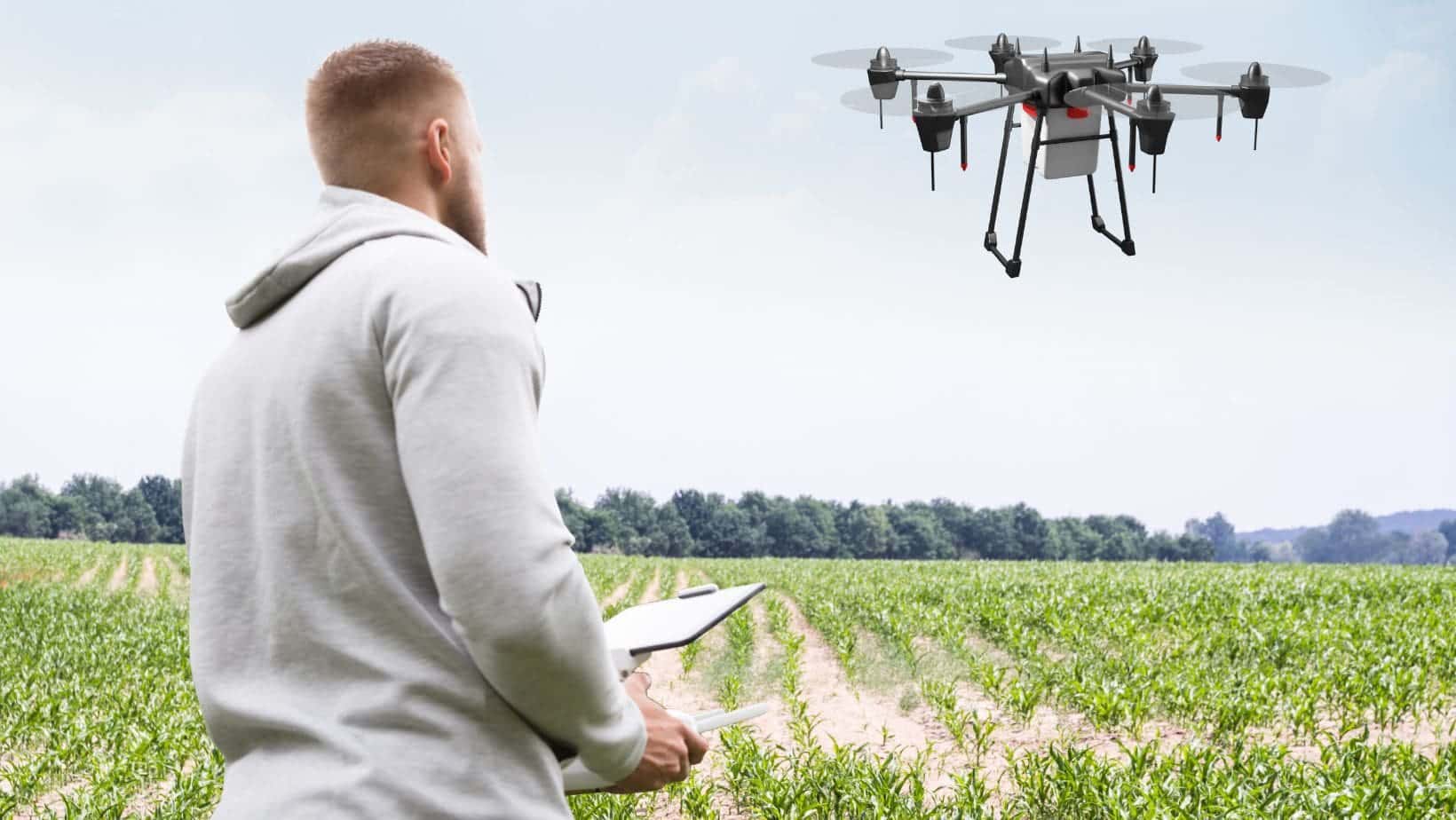 image of a drone being used in a crop field